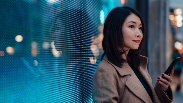 Woman holding mobile phone