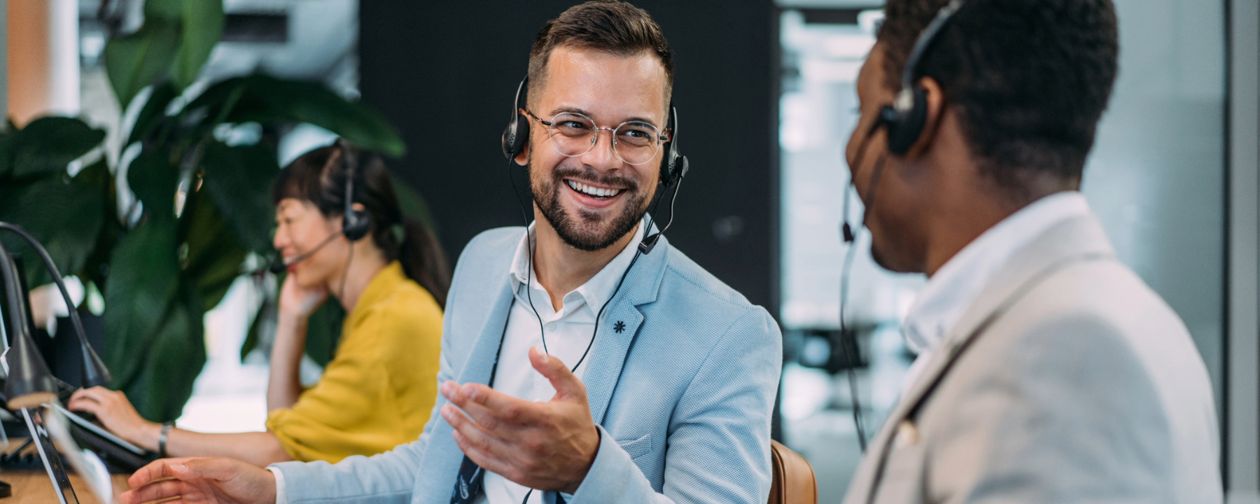 Call center operators working in the office