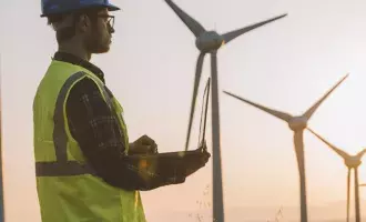 Utilities engineer on wind farm