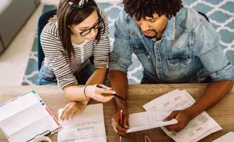 Couple looking at bills