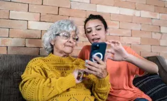 Granddaughter helping grandmother