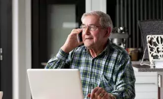 senior talking on phone