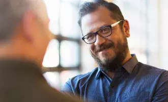 businessmen-talking-in-office