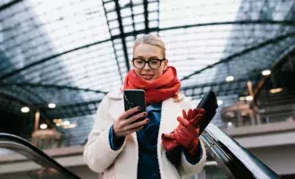 woman looking at phone GettyImages-1129928085