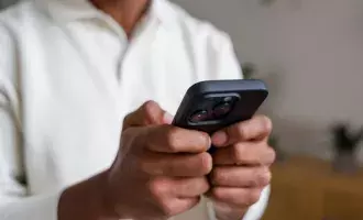 Man using smartphone browsing internet