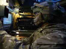 Army attracts candidates using virtual reality Soldier looking at VR screen