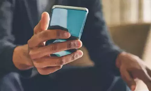 Man holding mobile phone