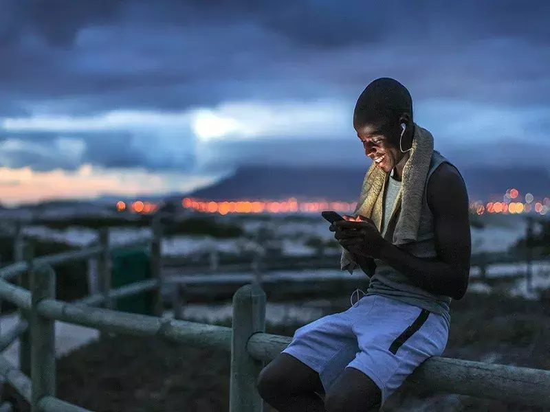 Young teenager looking at phone