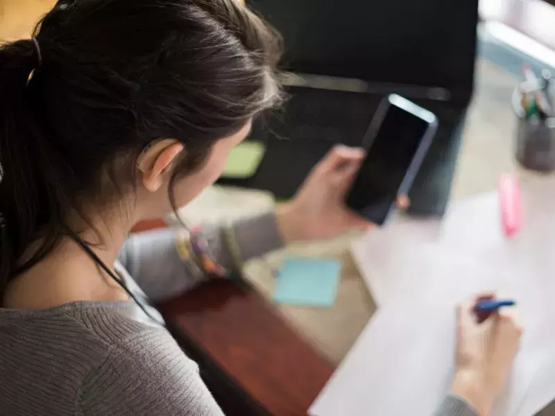 Young woman designer working at home