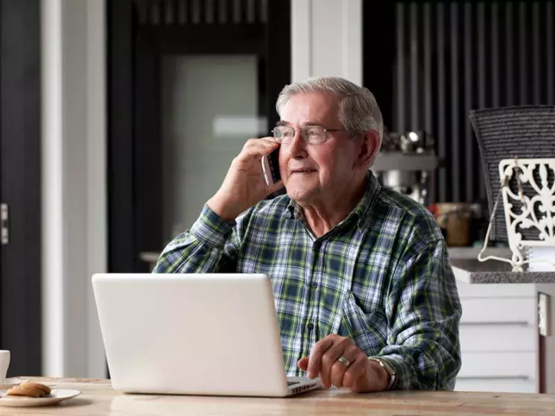 senior talking on phone