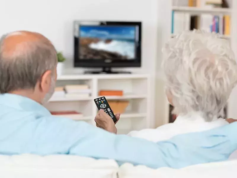 Senior couples are watching TV
