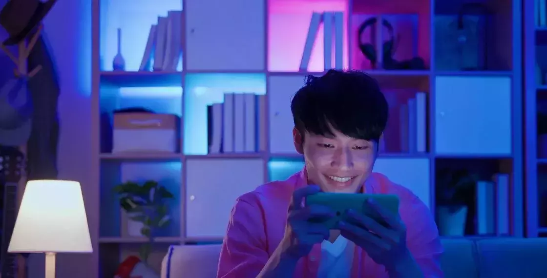 Man playing game on phone