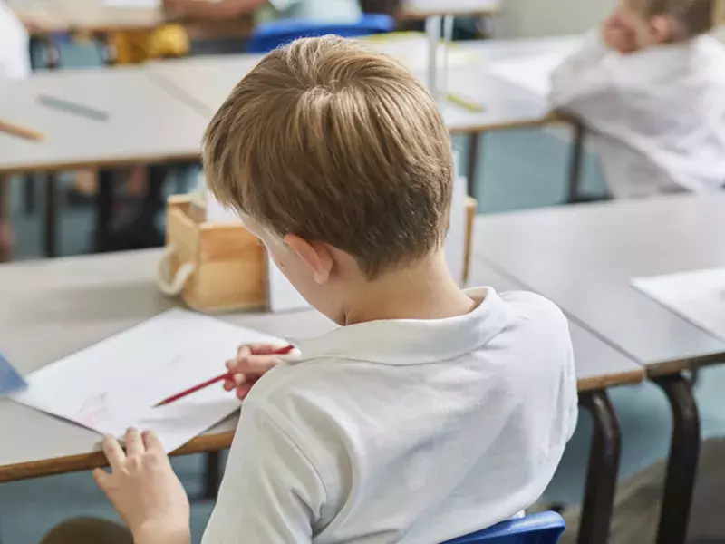 School child in classrom